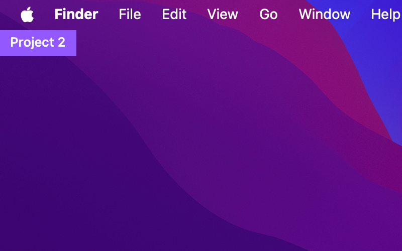 The current Space's name shown as a label in the corner of the desktop